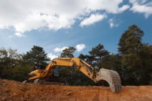 excavator digging on construction site